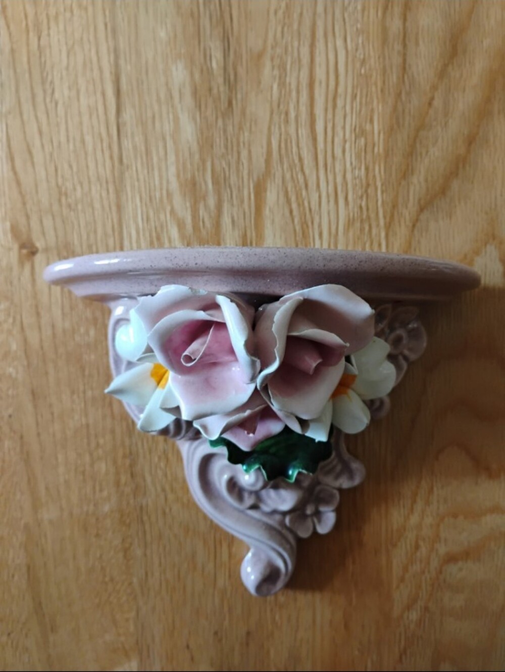Pink Ceramic Wall Shelf with Floral Accent